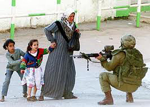 Soldier with gun, woman with children